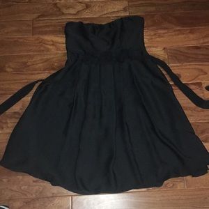 Strapless silky dress with rose accents